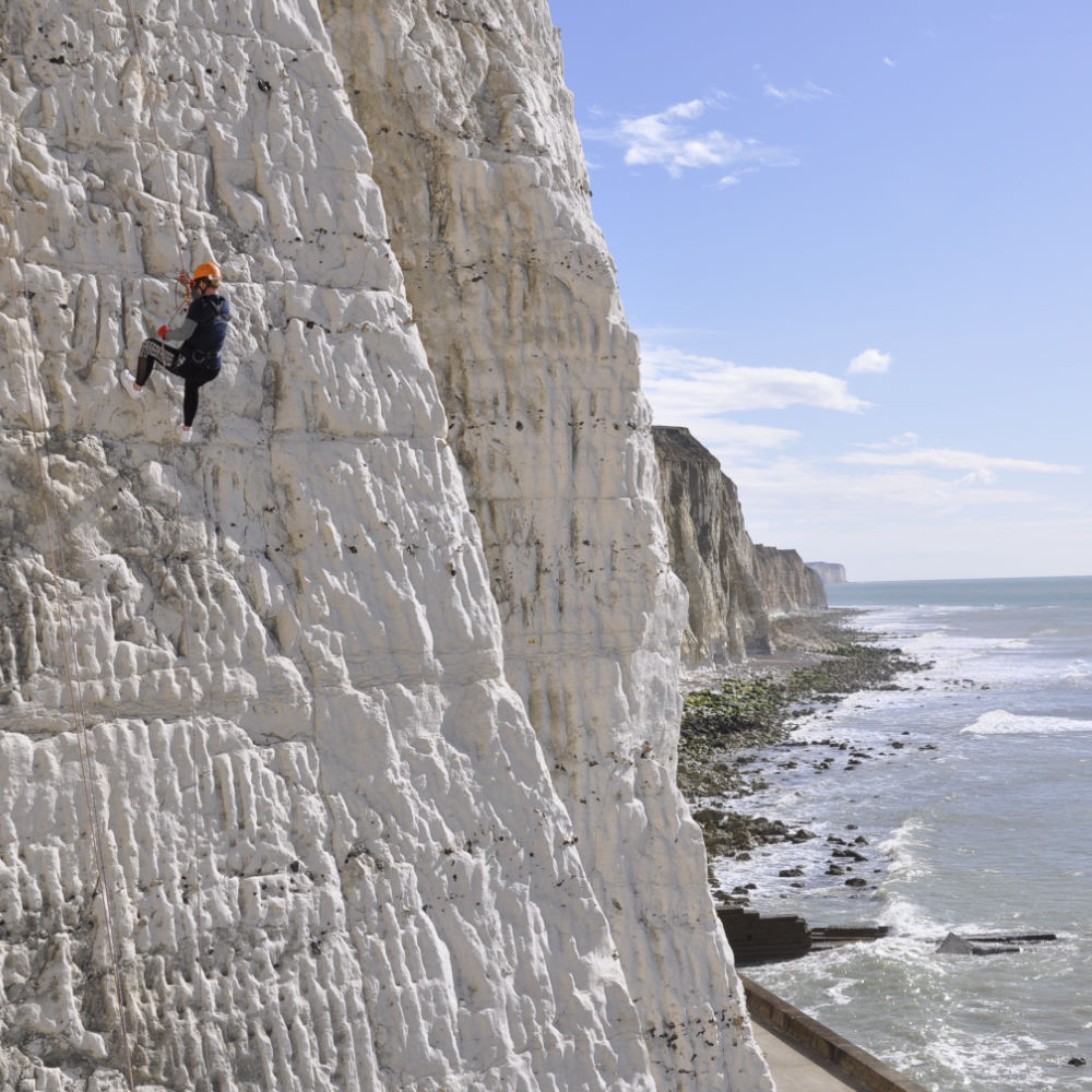 image shows an individual abseiling at peacehaven 